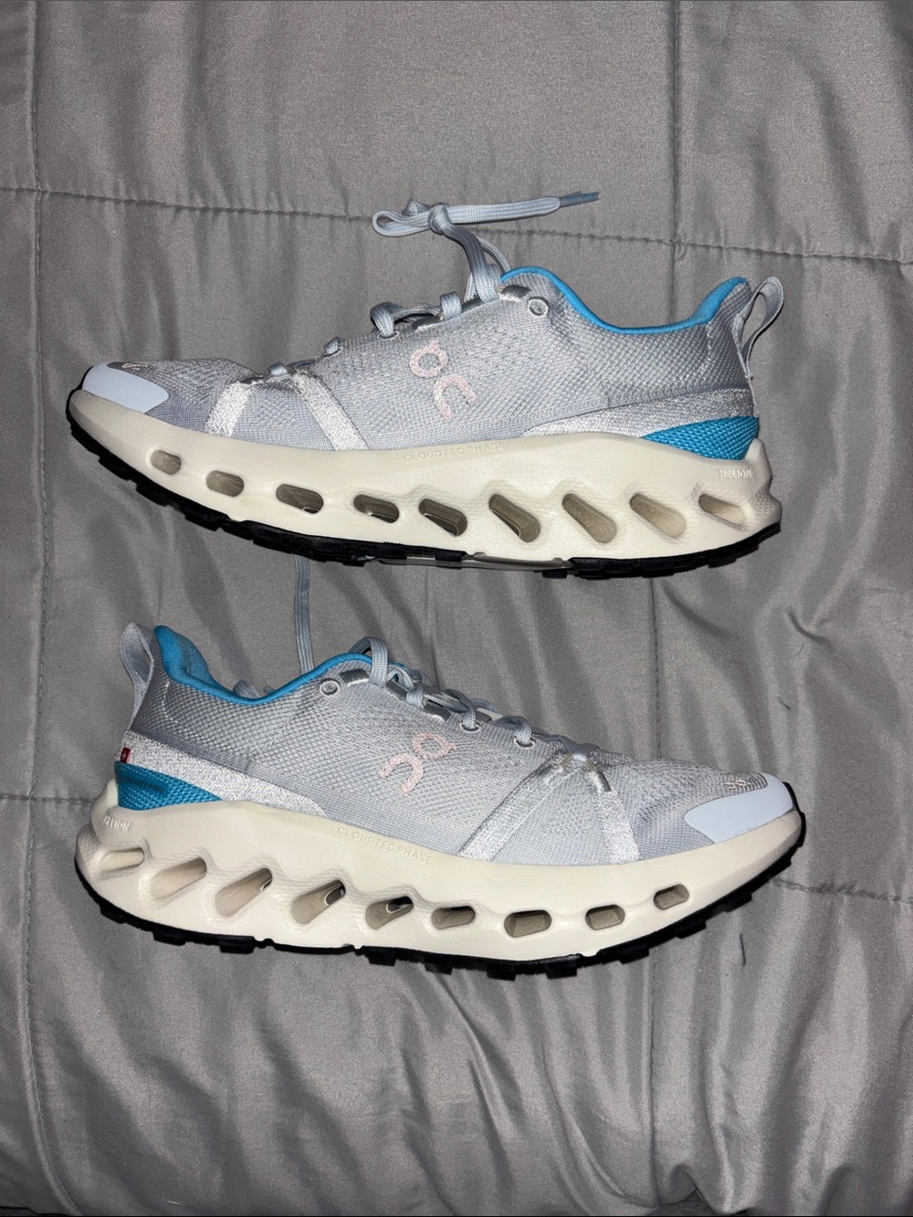 On Running Women's Sneakers in Light Gray with Blue Accents
